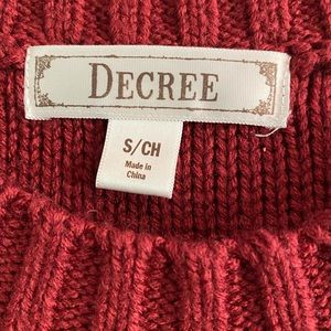 Decree burgundy sweater dress slim fitting. Very flattering on.